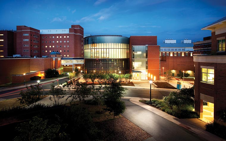 Claude Moore Education Building at night