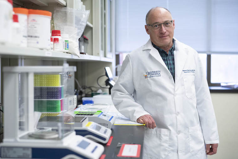 Steven Zeichner looks purposeful in his lab.