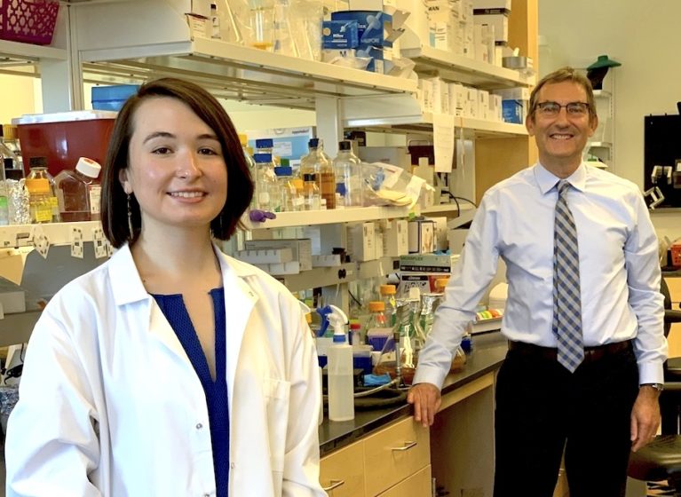 Amanda Ward and Lukas Tamm pose in the lab.