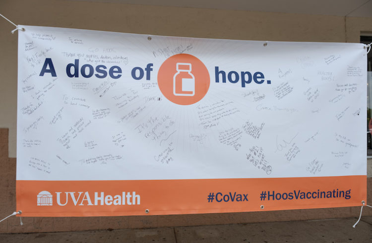 A banner promotes vaccination at UVA Health.