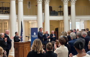 People clapping as University of Virginia leaders and Virginia Gov. Glenn Youngkin announce the new Paul and Diane Manning Institute of Biotechnology