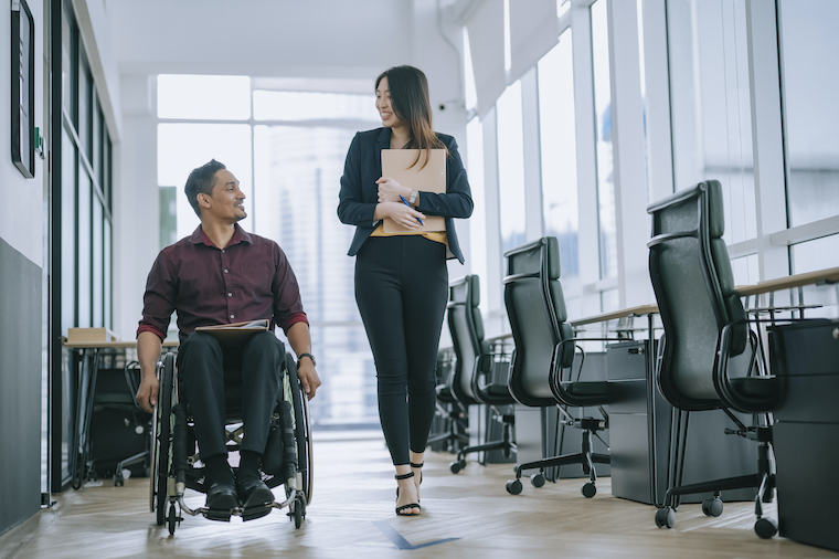 Man in wheelchair in office