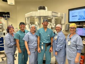 Portrait of robotic-assisted surgery team