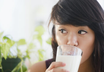 Woman drinks milk