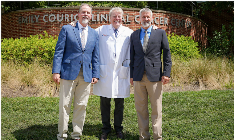 Charles Chalfant, Thomas P. Loughran Jr. and David Feith outside the Emily Couric Clinical Cancer Center.